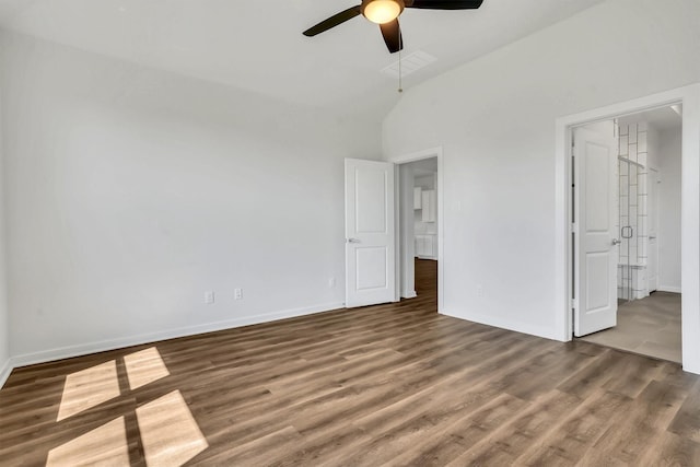 unfurnished bedroom with high vaulted ceiling, ceiling fan, and dark wood-type flooring