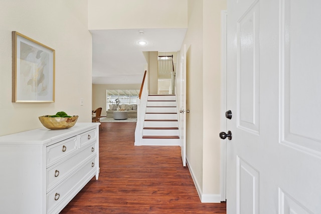 corridor featuring dark wood-type flooring