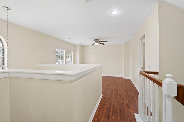 corridor featuring dark wood-type flooring