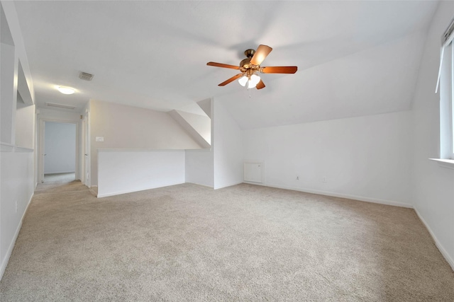 bonus room featuring light carpet, ceiling fan, and lofted ceiling