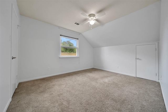 bonus room with carpet, ceiling fan, and lofted ceiling