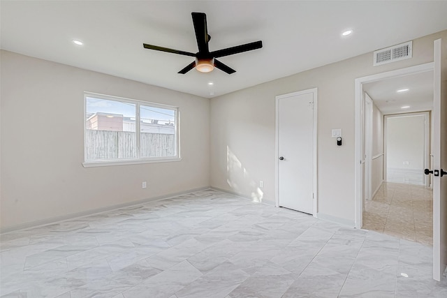 interior space featuring ceiling fan