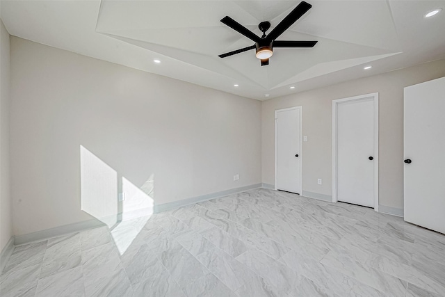 unfurnished bedroom featuring ceiling fan and lofted ceiling