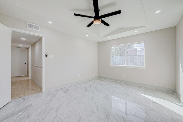 unfurnished room featuring ceiling fan and lofted ceiling