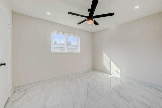 spare room featuring ceiling fan