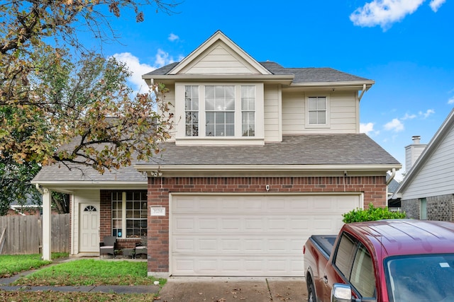 view of front property with a garage