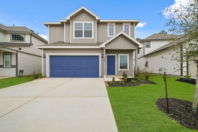 view of front of property featuring driveway, a garage, a front lawn, and board and batten siding