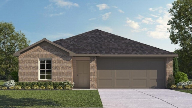 view of front facade with a front yard and a garage