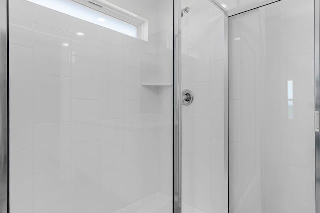 bathroom with an enclosed shower