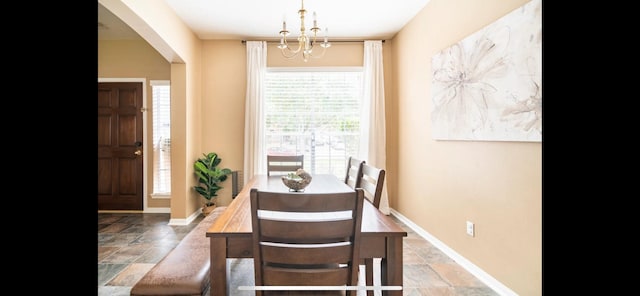 dining room with an inviting chandelier