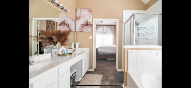 bathroom featuring vanity, independent shower and bath, and lofted ceiling