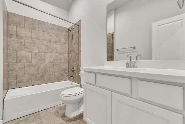 full bathroom featuring vanity, toilet, and tiled shower / bath