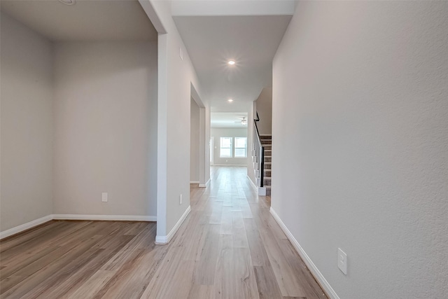 hall with light wood-type flooring