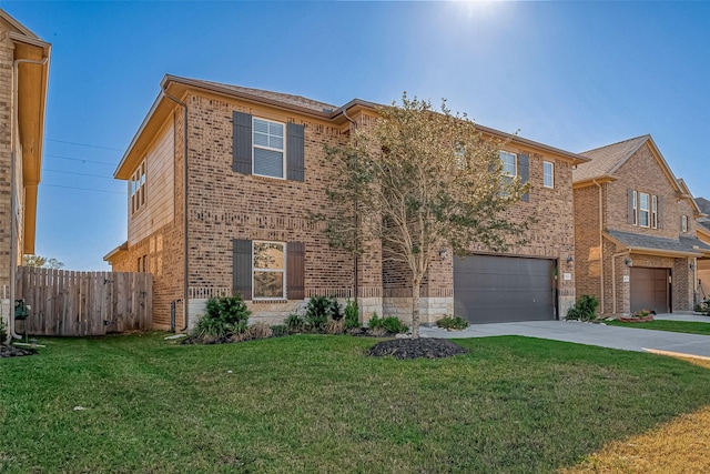 view of front of home featuring a garage and a front lawn