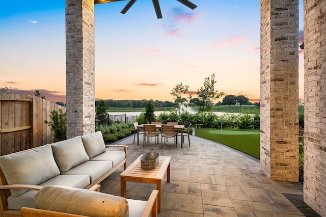 patio terrace at dusk with outdoor lounge area