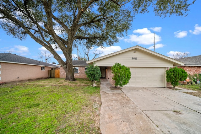 single story home with a front yard and a garage