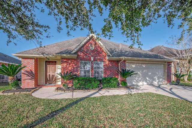 single story home with a front yard and a garage