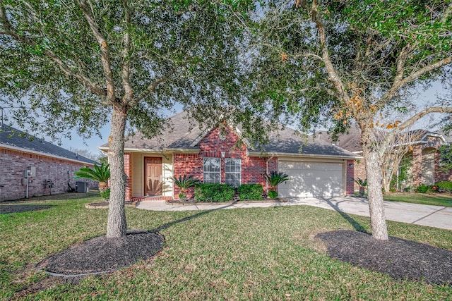 view of front of home featuring a front yard, a garage, and central AC unit