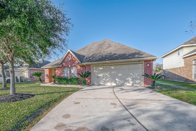 view of front facade featuring a garage and a front lawn