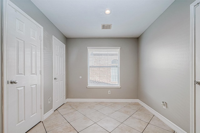 view of tiled empty room