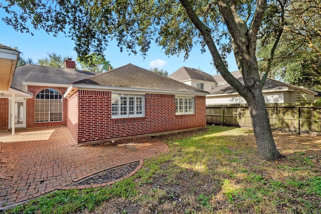 rear view of property with a patio