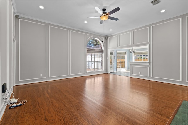 unfurnished living room with hardwood / wood-style flooring, ceiling fan with notable chandelier, and crown molding