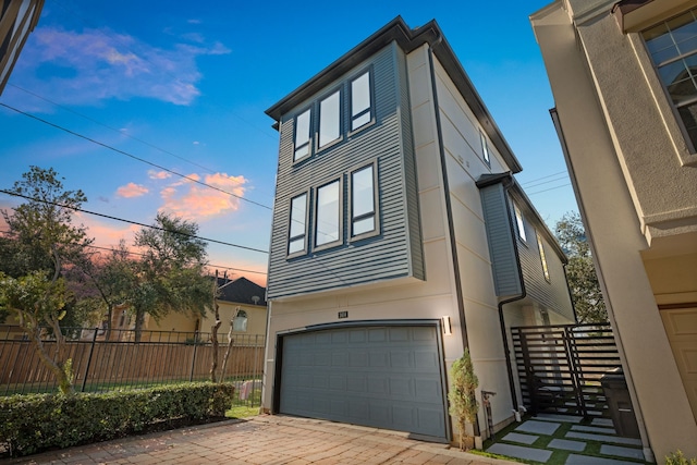 view of front of property featuring a garage