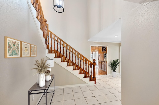 entryway featuring light tile patterned flooring