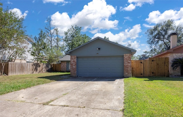 exterior space with a front lawn and a garage