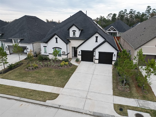 french country inspired facade with a garage