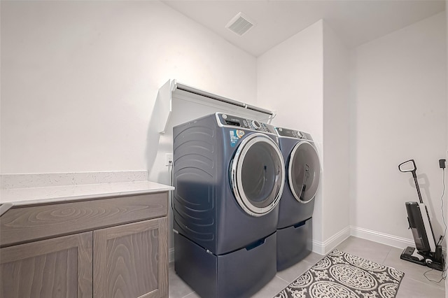 28212 Cedar Peak Dr, Spring, TX 77386 - washroom featuring independent washer and dryer and light tile patterned flooring
