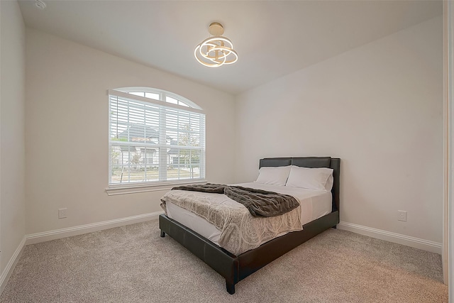 28212 Cedar Peak Dr, Spring, TX 77386 - bedroom with carpet floors and a chandelier