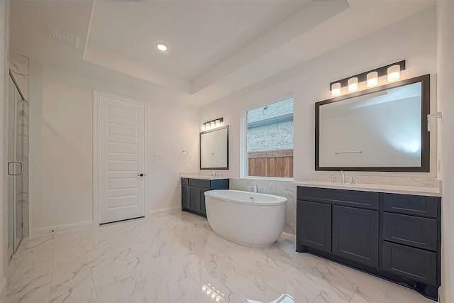28212 Cedar Peak Dr, Spring, TX 77386 - bathroom featuring a shower stall, two vanities, a freestanding tub, marble finish flooring, and a tray ceiling