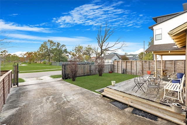 view of yard featuring a wooden deck