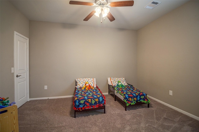 interior space with carpet floors and ceiling fan