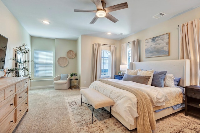 carpeted bedroom featuring ceiling fan