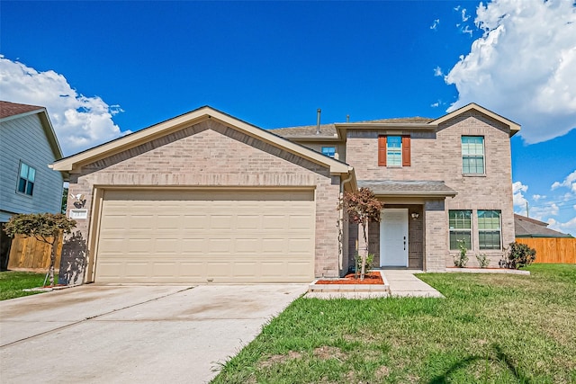 view of front of home with a garage and a front lawn