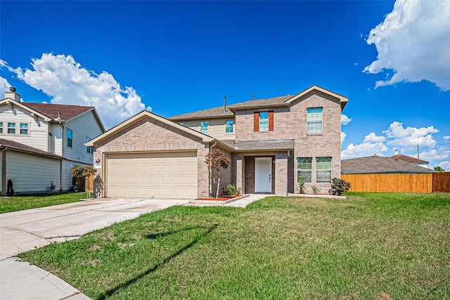 view of property with a garage and a front yard