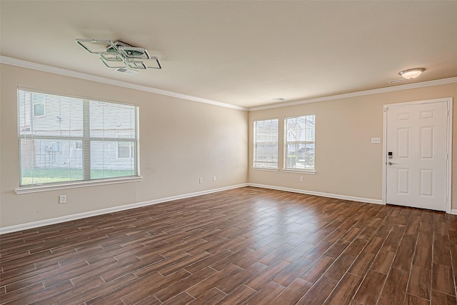 interior space featuring dark hardwood / wood-style floors, a wealth of natural light, and crown molding