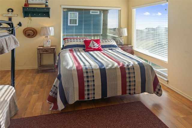 bedroom with wood-type flooring