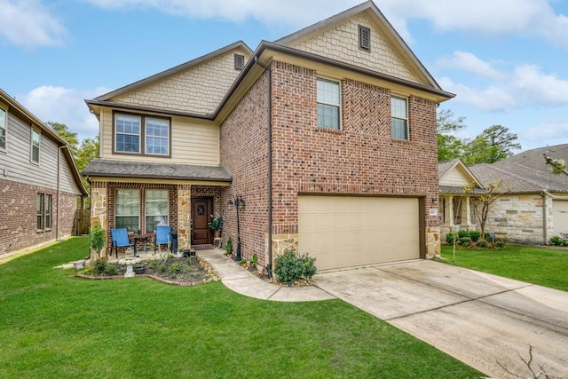 view of front facade with a front yard and a garage