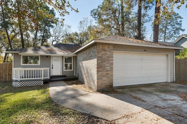 ranch-style house featuring a garage