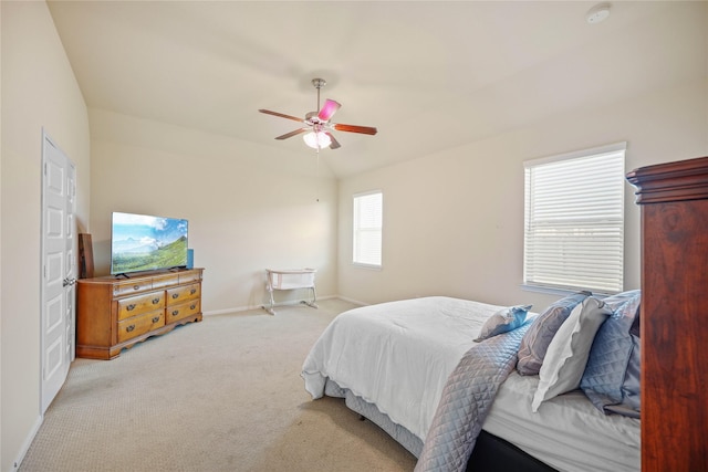 bedroom with light carpet and ceiling fan