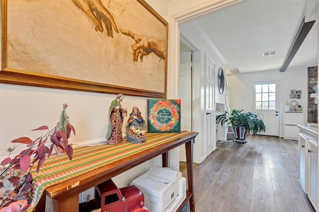 interior space with hardwood / wood-style flooring