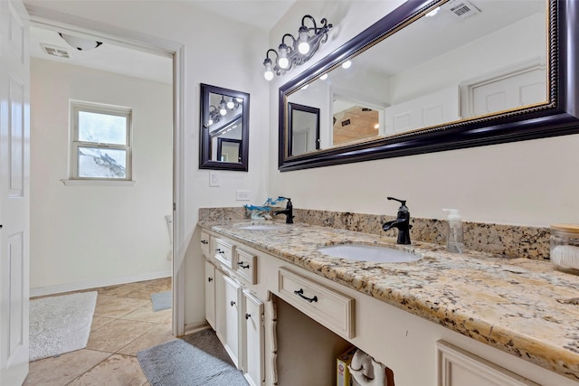 bathroom featuring vanity and tile patterned floors