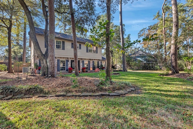 view of front of home with a front lawn