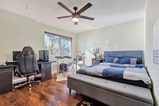 bedroom featuring ceiling fan and dark hardwood / wood-style flooring