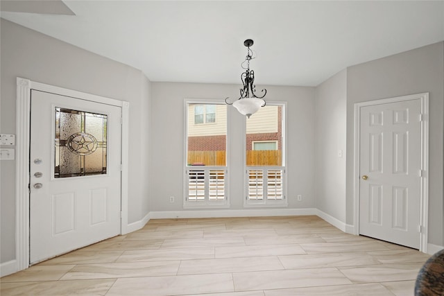 unfurnished dining area featuring a wealth of natural light