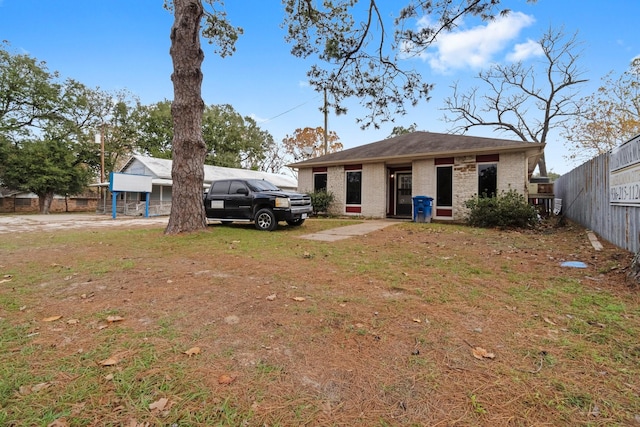 exterior space featuring a front yard