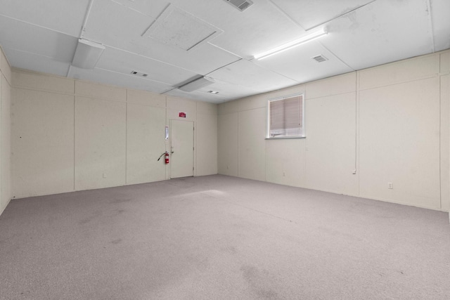 empty room featuring carpet floors